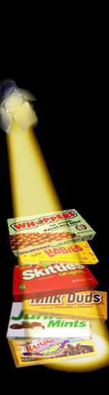 a stack of theater box candy in the spotlight