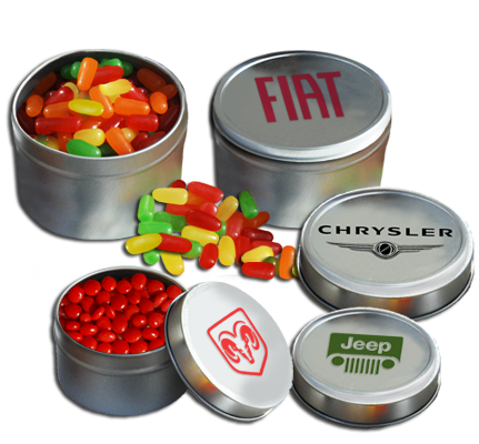 imprinted tin cans filled with Mike and Ike, Reeses Pieces and other candy